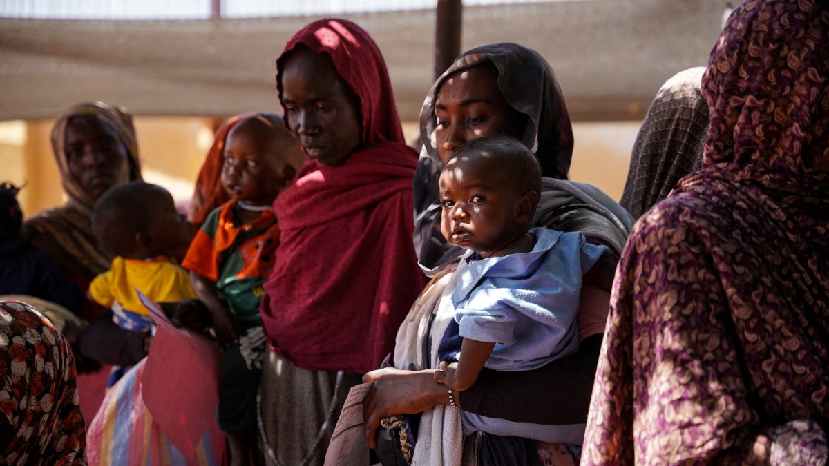 Women and babies at the Zamzam displacement camp, close to El Fasher, North Darfur, Sudan, Jan. 2, 2024. (Reuters Photo)