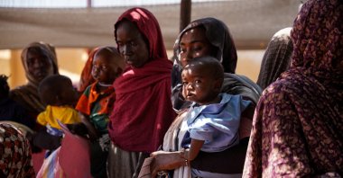 Women and babies at the Zamzam displacement camp, close to El Fasher, North Darfur, Sudan, Jan. 2, 2024. (Reuters Photo)