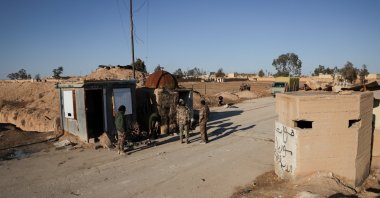 Members of the Syrian army stand guard at the al-Shaddadi prison, following the withdrawal of the YPG and its takeover by the Syrian army, as inmates, mostly members of Daesh, fled the facility, al-Shaddadi, Hassakeh, Syria, Jan. 20, 2026. (Reuters Photo)