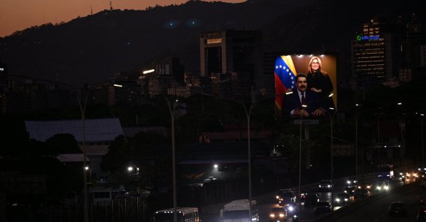 A billboard with an image of ousted President Nicolas Maduro and his wife, Cilia Flores, is displayed following their capture by U.S. forces, Caracas, Venezuela, Jan. 18, 2026. (Reuters Photo)