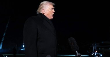 U.S. President Donald Trump talks to the press as he walks to board Marine One at the White House, Washington, U.S., Jan. 20, 2026. (AFP Photo)