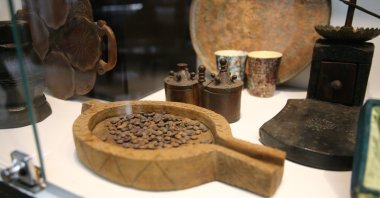 Coffee-making tools and coffee beans on display at the Coffee House Museum, Adana, southern Türkiye, Jan. 7, 2026. (AA Photo)