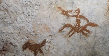 This handout photograph, released by Griffith University's Maixme Aubert, shows a view of prehistoric cave paintings in the Sulawesi island of Indonesia, Jan. 21, 2026. (AFP Photo via  Griffith University)