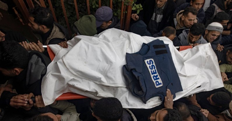 Mourners carry the bodies of three journalists through Nasser Hospital in Khan Yunis, southern Gaza Strip, Jan. 21, 2026. (EPA Photo)