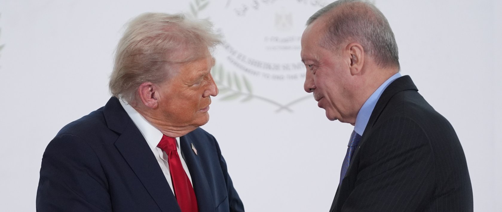 President Donald Trump greets President Recep Tayyip Erdoğan during a summit in Sharm El Sheikh, Egypt, Oct. 13, 2025. (AP Photo) 