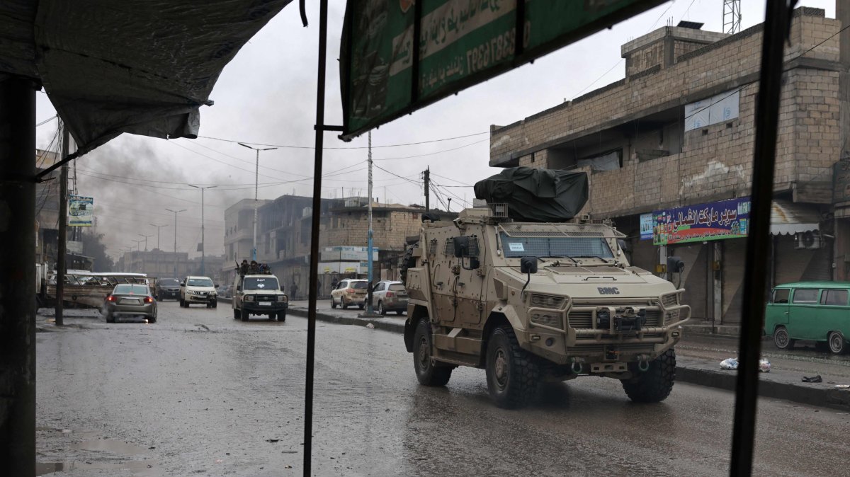Syrian army personnel patrol the streets of Tabqa, on the southwestern banks of the Euphrates, Raqqa province, Syria, Jan. 18, 2026. (AFP Photo)