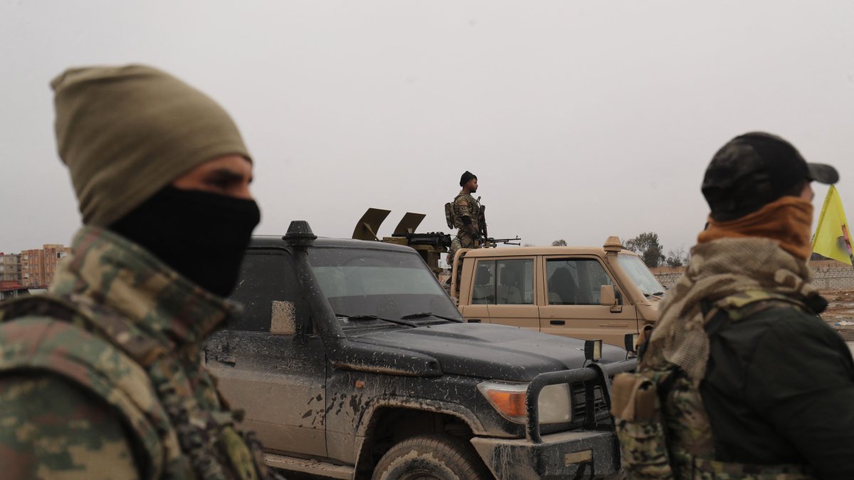 SDF terrorists take positions in the areas near the prison in Hassakeh, Jan. 22, 2026. (AFP Photo)