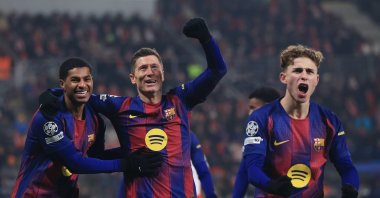 Barcelona's Robert Lewandowski (C) celebrates with his teammates after scoring the 2-4 goal during the UEFA Champions League match against Slavia Prague, Prague, Czechia, Jan. 21, 2026. (EPA Photo)