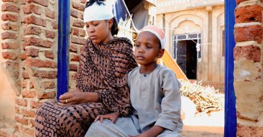 People injured during a drone strike sit in el-Obeid, Kordofan, Sudan, Jan. 12, 2026. (Reuters Photo)