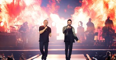 Renowned singer Tarkan (R) and veteran comedian Cem Yılmaz take the stage at Volkswagen Arena, Istanbul, Türkiye, Jan. 20, 2026. (Photo Courtesy of Hakan Uç)
