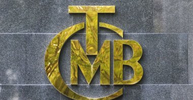 A logo of the Turkish central bank is pictured at the entrance of its headquarters in Ankara, Türkiye, Oct. 15, 2021. (Reuters Photo)