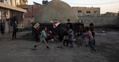 Displaced Palestinian children play at Bilal Mosque in Khan Younis, southern Gaza Strip, Jan. 20, 2026. (EPA Photo)