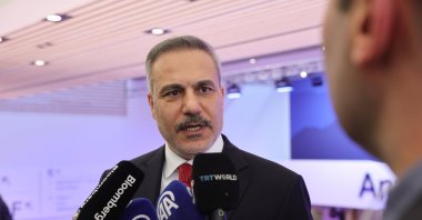 Foreign Minister Hakan Fidan speaks to reporters at Davos, Switzerland, Jan. 22, 2026. (AA Photo)