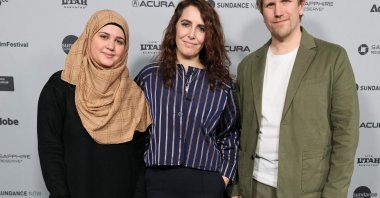 (L-R) Isra’a, Itab Azzam and Jack MacInnes attend the "One In A Million" Premiere during the 2026 Sundance Film Festival at The Yarrow Theatre in Park City, Utah, U.S., Jan. 23, 2026. (AFP Photo)