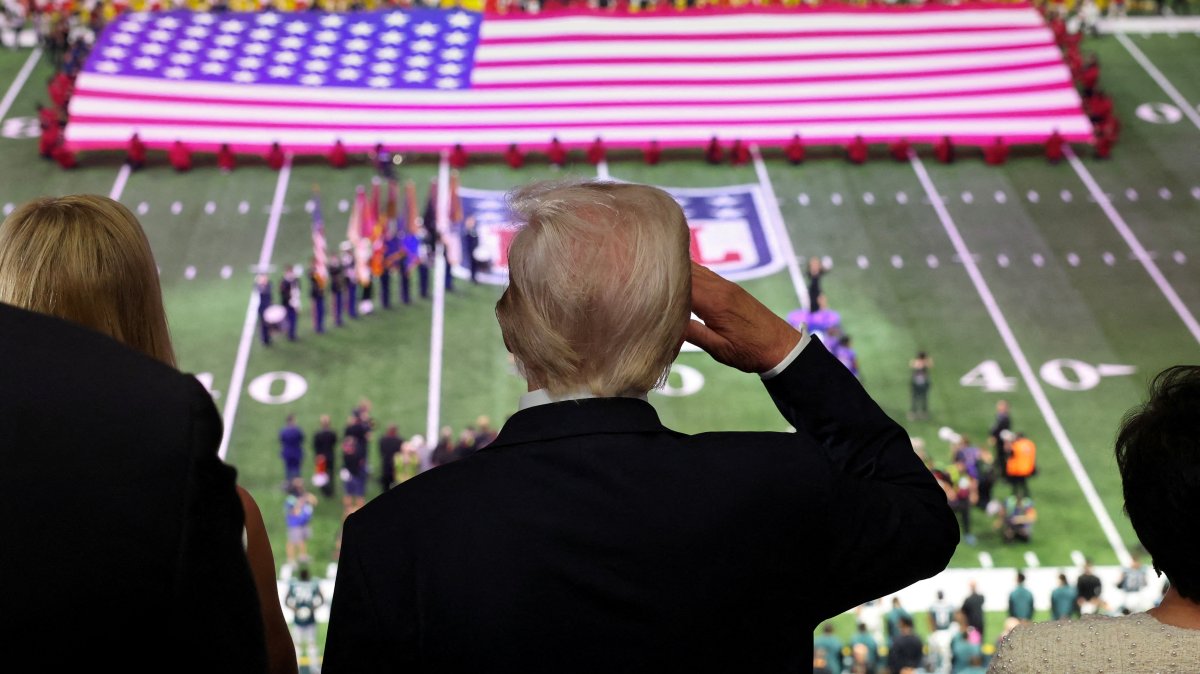 U.S. President Donald Trump salutes during the national anthem at the Super Bowl, New Orleans, U.S., Feb. 9,  2025. (Reuters Photo)