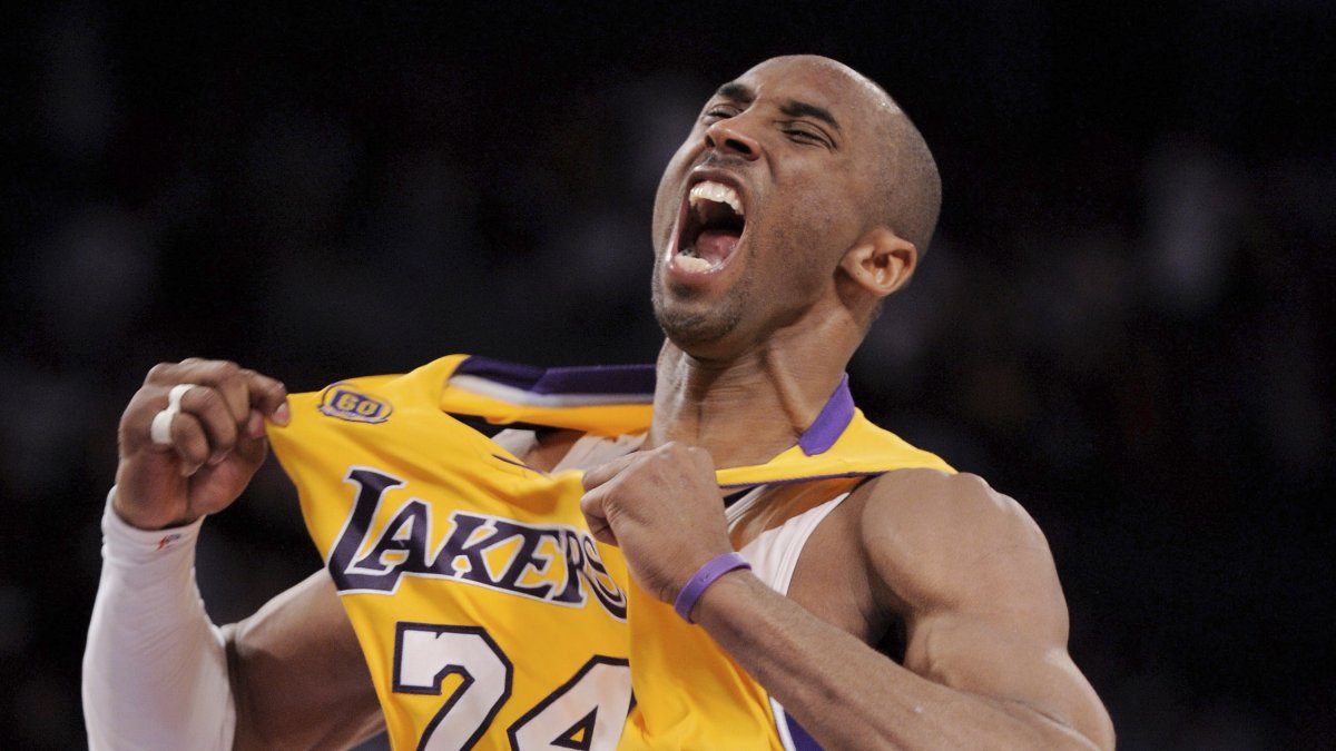 Los Angeles Lakers guard Kobe Bryant reacts after making a three-point shot during the second half of Game 2 of a first-round NBA playoff basketball game against the Denver Nuggets, Los Angeles, U.S., April 23, 2008. (AP Photo)