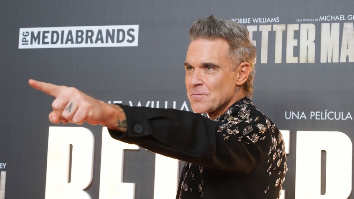 Robbie Williams breaks Beatles’ record for chart-topping albums