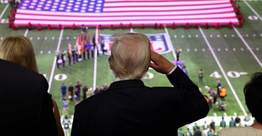 U.S. President Donald Trump salutes during the national anthem at the Super Bowl, New Orleans, U.S., Feb. 9,  2025. (Reuters Photo)