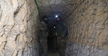 Syrian army soldiers are seen in newly discovered tunnels dug by the YPG terrorist group in the Manbij district of Aleppo province, Syria, Jan. 25, 2026. (AA Photo) 