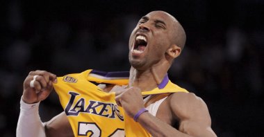 Los Angeles Lakers guard Kobe Bryant reacts after making a three-point shot during the second half of Game 2 of a first-round NBA playoff basketball game against the Denver Nuggets, Los Angeles, U.S., April 23, 2008. (AP Photo)