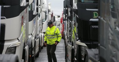 A truck driver stands during a protest by truck drivers and transport union representatives over disruptions linked to the European Union's new Entry-Exit System, at the North Macedonia-Greece border crossing in Gevgelija, Jan. 26, 2026. (Reuters Photo)