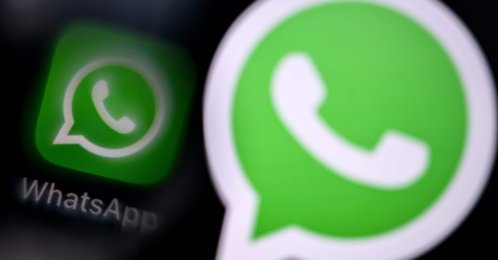 This illustration photograph shows the logo of U.S. instant messaging software WhatsApp displayed on a smartphone's screen, in Frankfurt am Main, western Germany, Dec.1, 2025. (AFP Photo) 