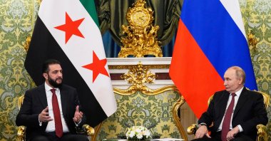 Russian President Vladimir Putin (R) and Syrian President Ahmad al-Sharaa talk during their meeting at the Grand Kremlin Palace, Moscow, Russia, Oct. 15, 2025. (AP Photo)