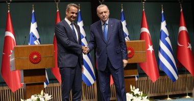 Greek Prime Minister Kyriakos Mitsotakis (L) and President Recep Tayyip Erdoğan shake hands after a joint news conference, Ankara, Türkiye, May 13, 2024. (AP Photo)