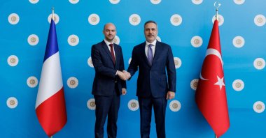 Foreign Minister Hakan Fidan (R) shakes hands with French Minister for Europe and Foreign Affairs Jean-Noel Barrot before their meeting, Ankara, Türkiye, Jan. 27, 2026. (Reuters Photo)