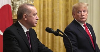 U.S. President Donald Trump (R) looks at President Recep Tayyip Erdoğan as a reporter asks a question at a press conference in the East Room of the White House, Washington, U.S., Nov. 13, 2019. (EPA File Photo)