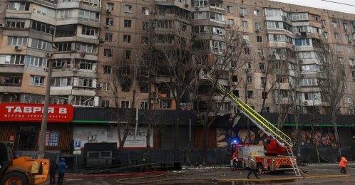 A firefighter works at the site of an apartment building hit during overnight Russian drone strikes, amid Russia's attack in Odesa, Ukraine, Jan. 27, 2026. (Reuters Photo)