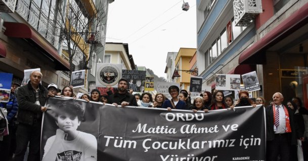 People carry placards reading “Children deserve to live, not die on the streets” during a march marking the first anniversary of 15-year-old Mattia Ahmet Minguzzi’s death, Ordu, Türkiye, Jan. 24, 2025. (AA Photo) 
