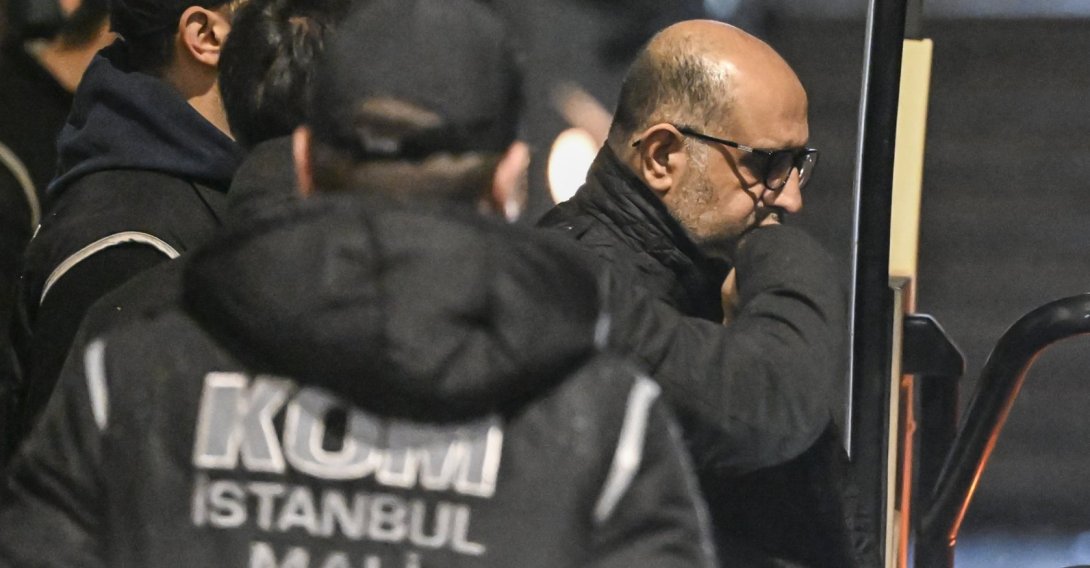 Police escort Aziz Ihsan Aktaş after his detention, Istanbul, Türkiye, Jan. 17, 2025. (AA Photo)