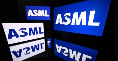 This photograph shows screens displaying the logo of the Dutch group Advanced Semiconductor Materials Lithography (ASML), Toulouse, France, Sept. 9, 2025. (AFP Photo)