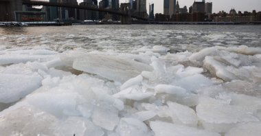 Ice builds up in the East River along the Brooklyn shoreline as New York City experiences frigid temperatures following a winter storm over the weekend, New York City, U.S., Jan. 27, 2026. (AFP Photo)