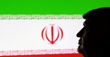 A 3D printed miniature of U.S. President Donald Trump and Iranian flag are seen in this illustration taken Jan. 9, 2026. (Reuters Photo)