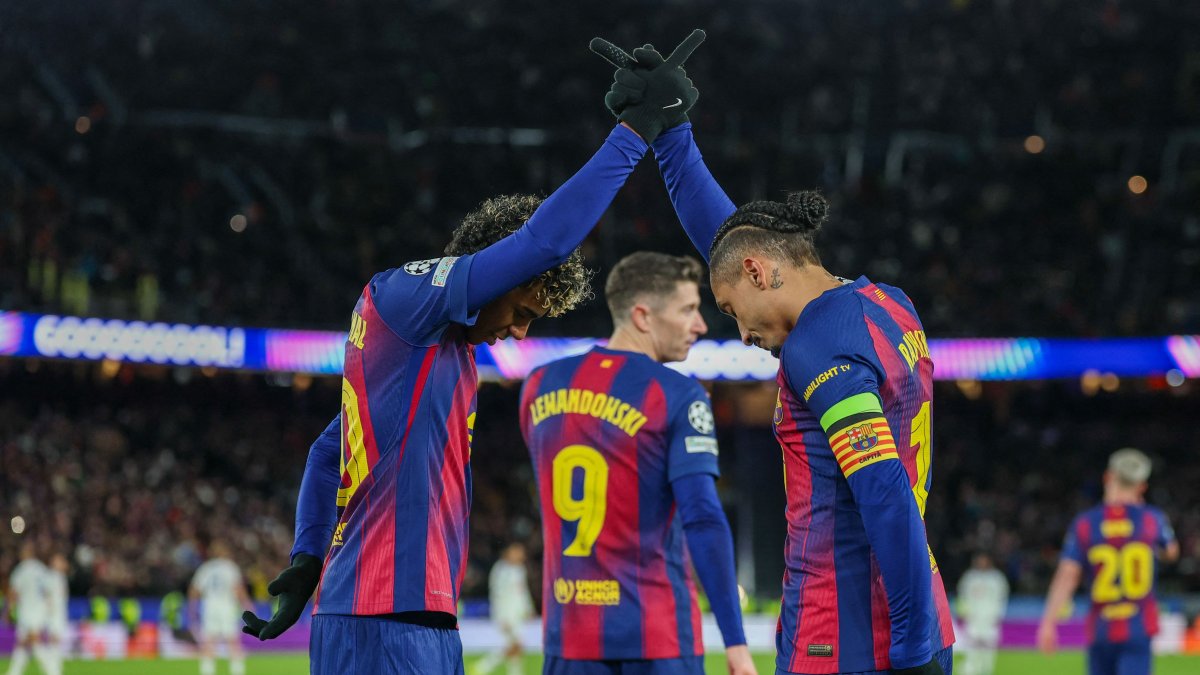 Barcelona's Raphinha (R) celebrates scoring his team's third goal with teammate Lamine Yamal during the UEFA Champions League league phase match against Copenhagen at the Camp Nou Stadium, Barcelona, Spain, Jan. 28, 2026. (AFP Photo)