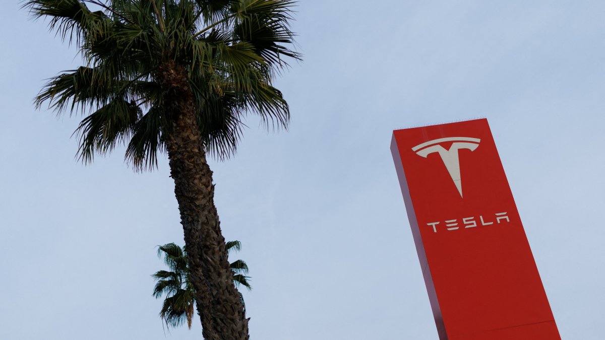 A sign marking a Tesla dealership is shown in Buena Park, California, U.S., Jan. 28, 2026. (Reuters Photo)