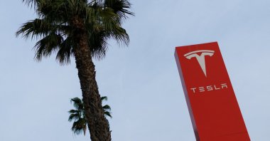 A sign marking a Tesla dealership is shown in Buena Park, California, U.S., Jan. 28, 2026. (Reuters Photo)