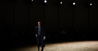 A model presents a creation by designer Anthony Vaccarello as part of his Menswear Fall/Winter 2026-2027 collection show for fashion house Saint Laurent during Men's Fashion Week, Paris, France, Jan. 27, 2026. (Reuters Photo)