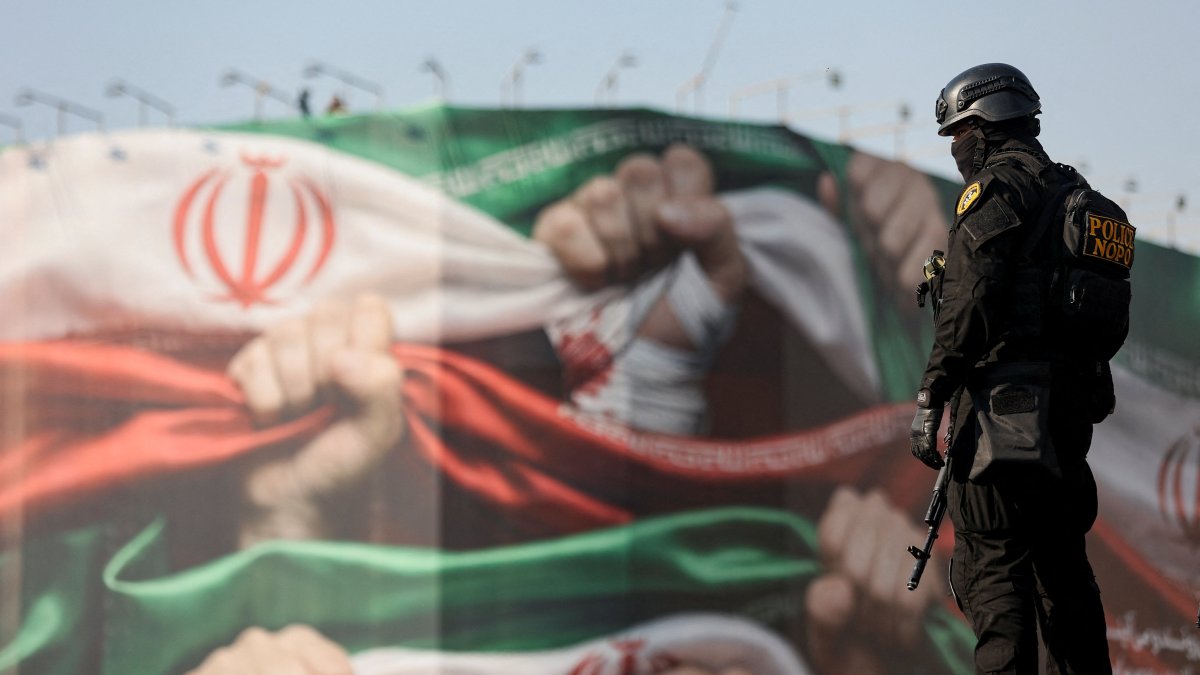 A member of the Iranian police attends a pro-government rally, Tehran, Iran, Jan. 12, 2026. (Reuters Photo)