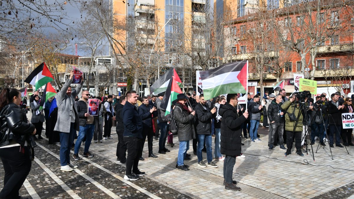 Protesters carry banners and Palestinian flags in Tirana, Albania, Jan. 30, 2026. (AA Photo)