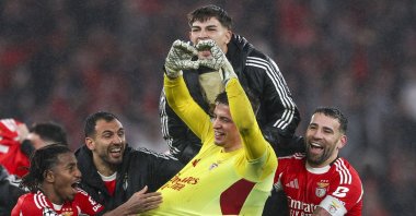 Benfica's goalkeeper Anatoliy Trubin (C-R) celebrates with his teammates after scoring the 4-2 goal during the UEFA Champions League soccer match between SL Benfica and Real Madrid, Lisbon, Portugal, Jan. 28, 2026. (EPA Photo)