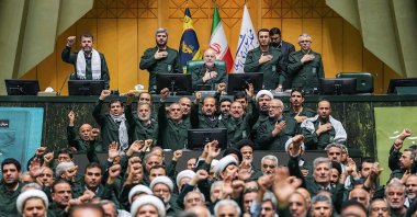 Members of Iran's parliament dressed in IRGC uniforms pose for a photo during a session in Tehran, Iran, Feb. 1, 2026. (AFP Photo)
