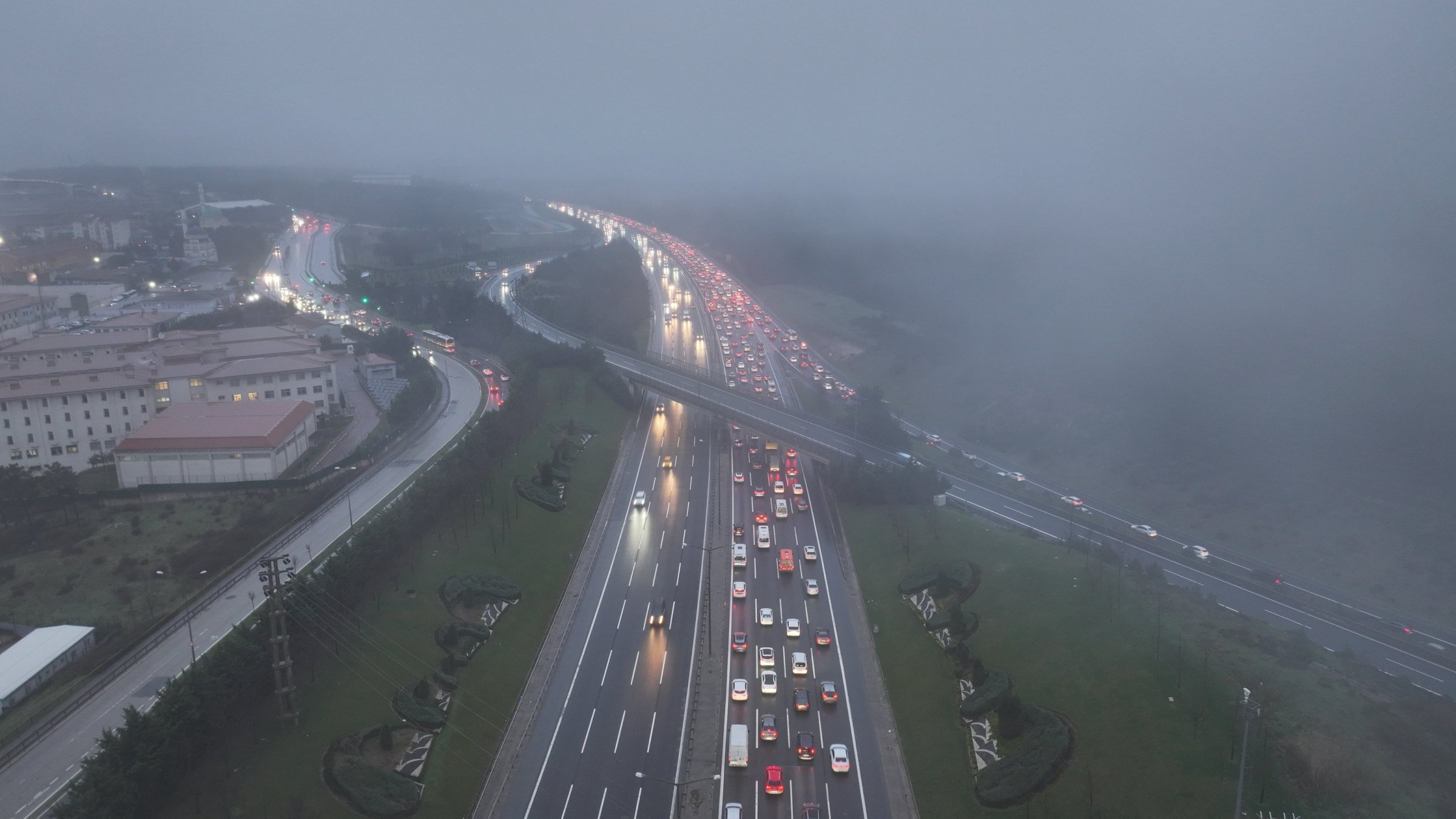 Traffic moves slowly on a rainy and foggy morning as low visibility and wet roads affect daily commuting, Istanbul, Türkiye, Feb. 2, 2026. (AA Photo)
