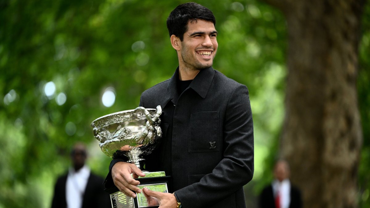 Spain's Carlos Alcaraz poses for a photograph with the Norman Brookes Challenge Cup after winning the Australian Open 2026 men’s singles final against Serbia's Novak Djokovic at the Royal Exhibition Building, Melbourne, Australia, Feb. 2, 2026. (EPA Photo)