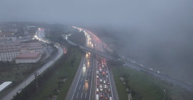 Traffic moves slowly on a rainy and foggy morning as low visibility and wet roads affect daily commuting, Istanbul, Türkiye, Feb. 2, 2026. (AA Photo)
