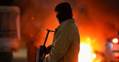 A member of the YPG terrorist group stands at a checkpoint, Qamishli, Syria, Jan. 27, 2026. (Reuters Photo)