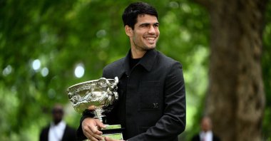 Spain's Carlos Alcaraz poses for a photograph with the Norman Brookes Challenge Cup after winning the Australian Open 2026 men’s singles final against Serbia's Novak Djokovic at the Royal Exhibition Building, Melbourne, Australia, Feb. 2, 2026. (EPA Photo)