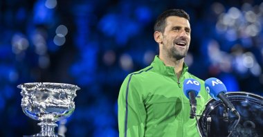 Serbia's Novak Djokovic addresses the crowd during the Australian Open trophy ceremony, Melbourne, Australia, Feb. 2, 2026. (AA Photo)